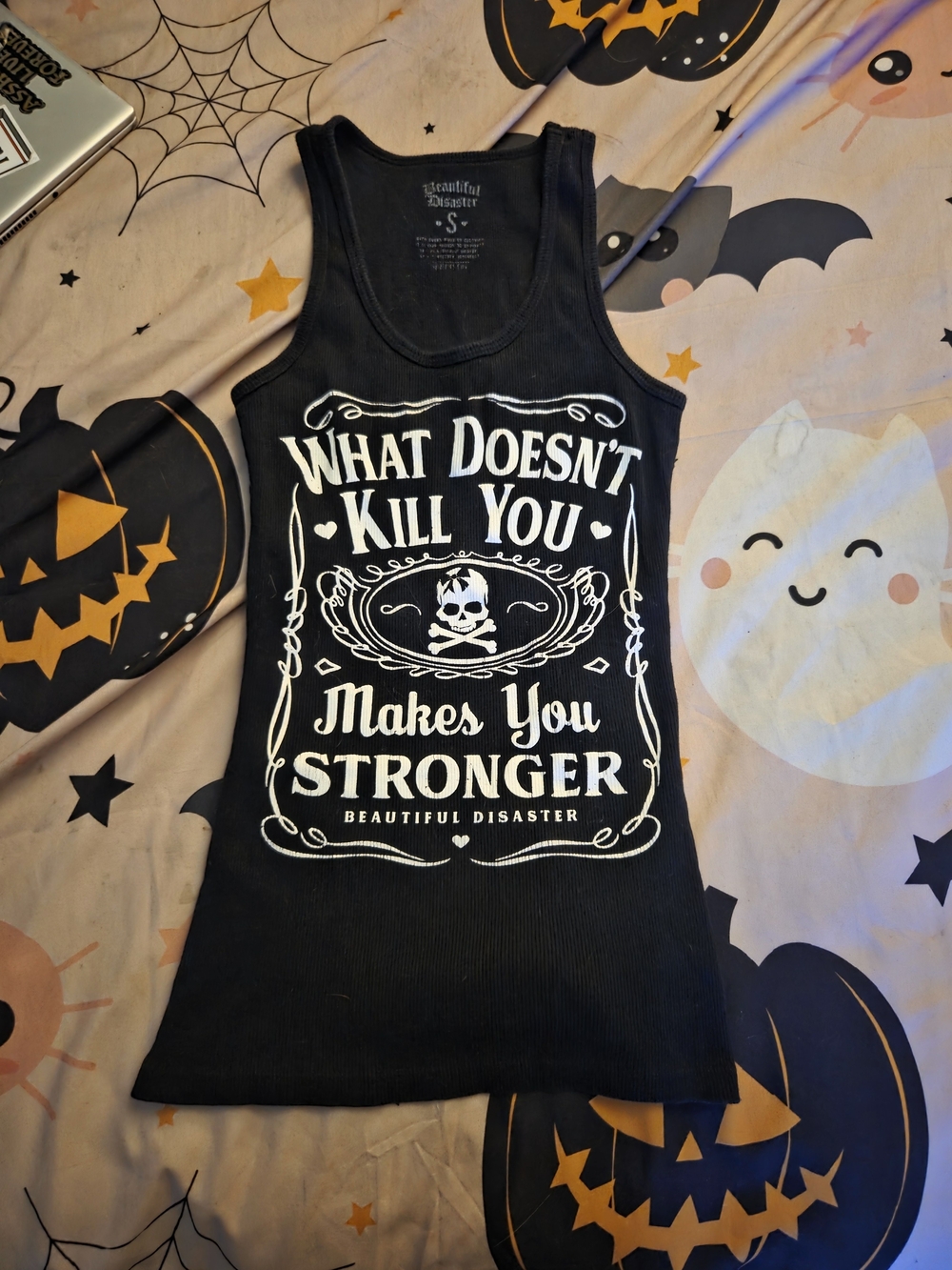 Black Graphic Tank Top — What Doesn't Kill You Makes You Stronger